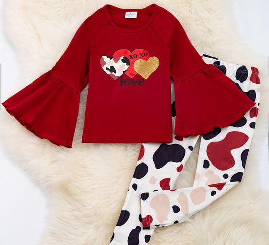 Xoxo love.  Burgundy Bell Sleeve. Cow leggings.